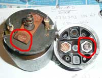 Solenoid dismantled showing burn marks.